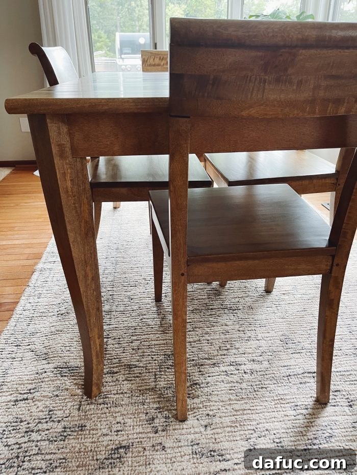 Applying new stain to dining table