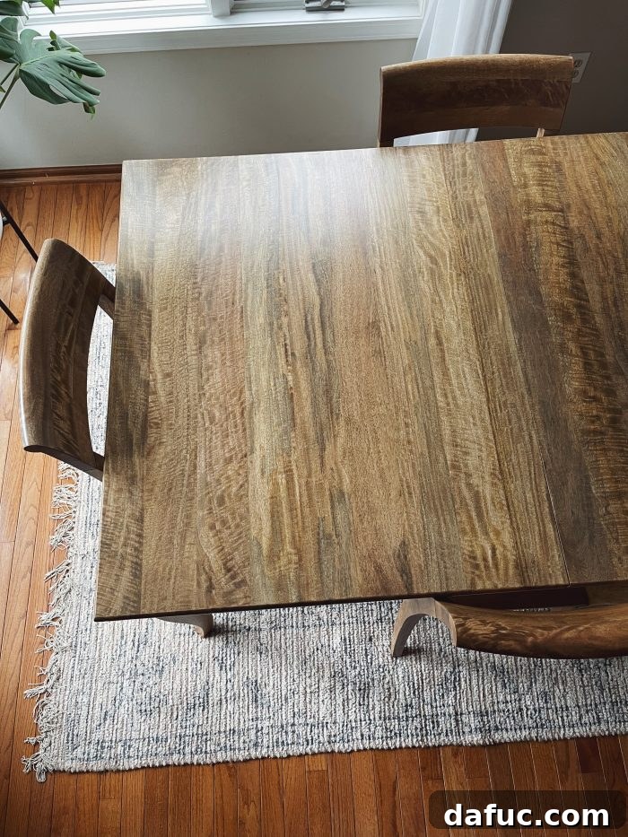 Dining table with lighter stain applied