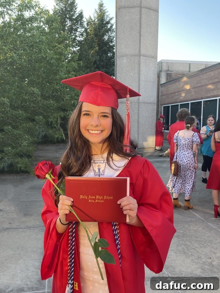 Unpacking 2022 31 Malloree celebrating high school graduation