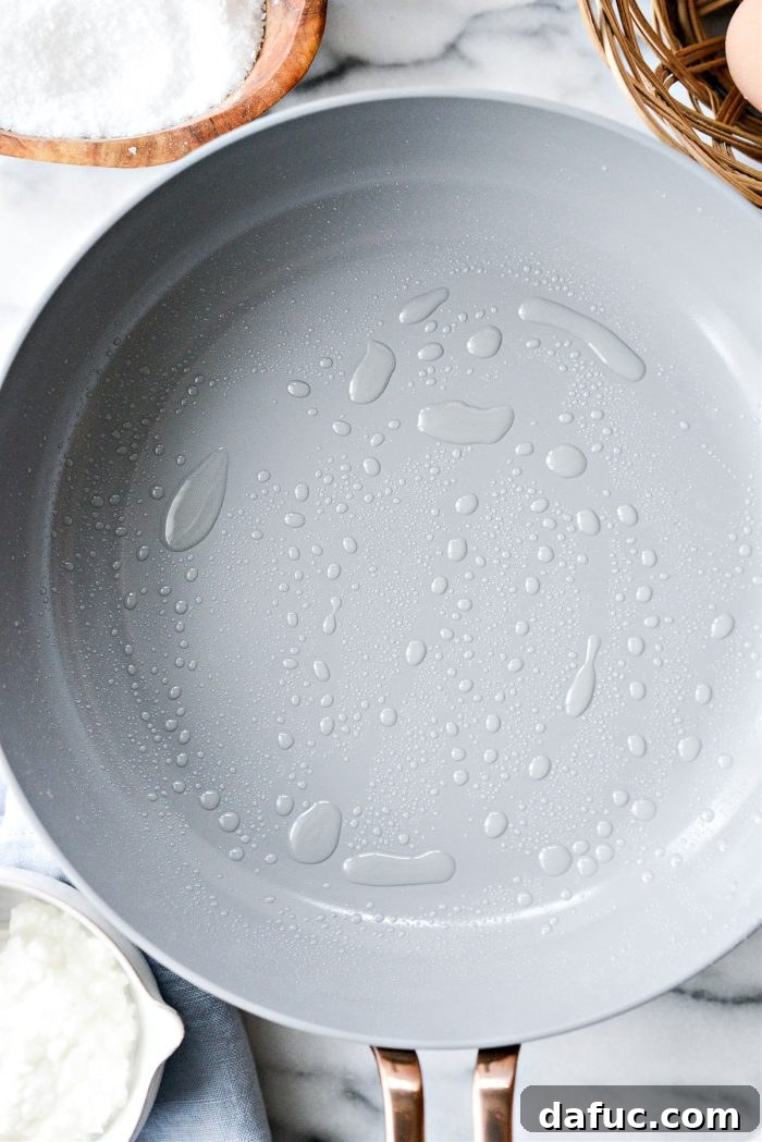 Creamy Cottage Scrambled Eggs 5 Spraying a nonstick pan with olive oil or ghee spray
