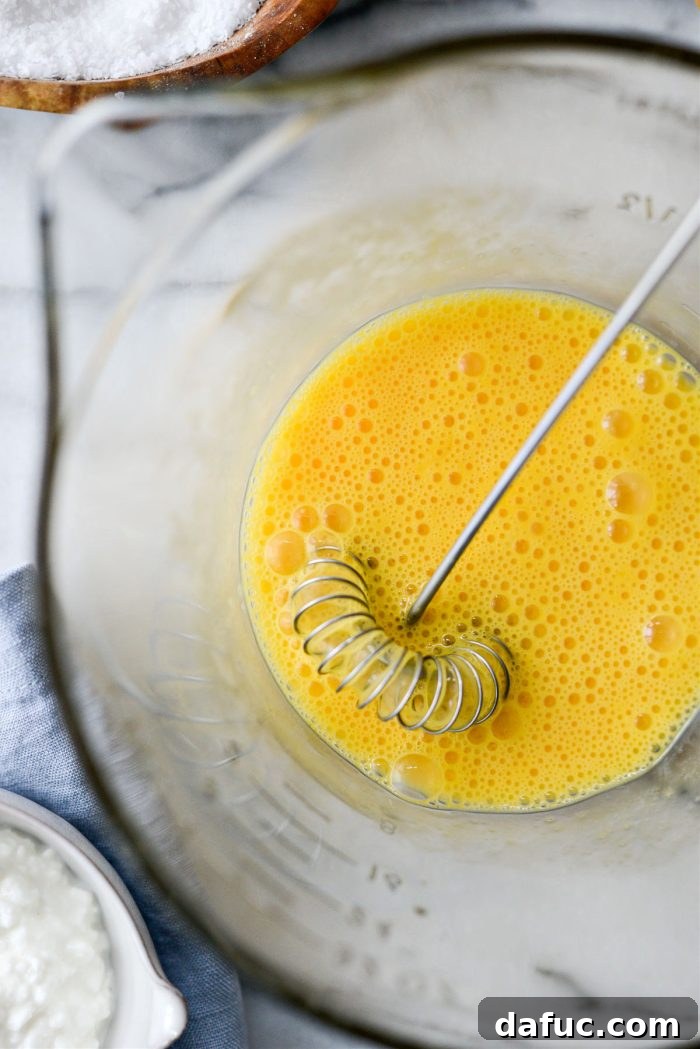 Creamy Cottage Scrambled Eggs 7 Whisking eggs until bubbly and well combined