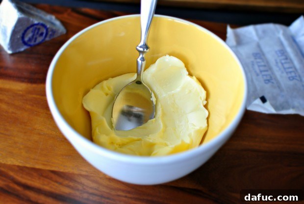 Seared Ribeye with Sweet Shallot Blue Cheese Butter 10 Mashing Softened Butter in a Bowl