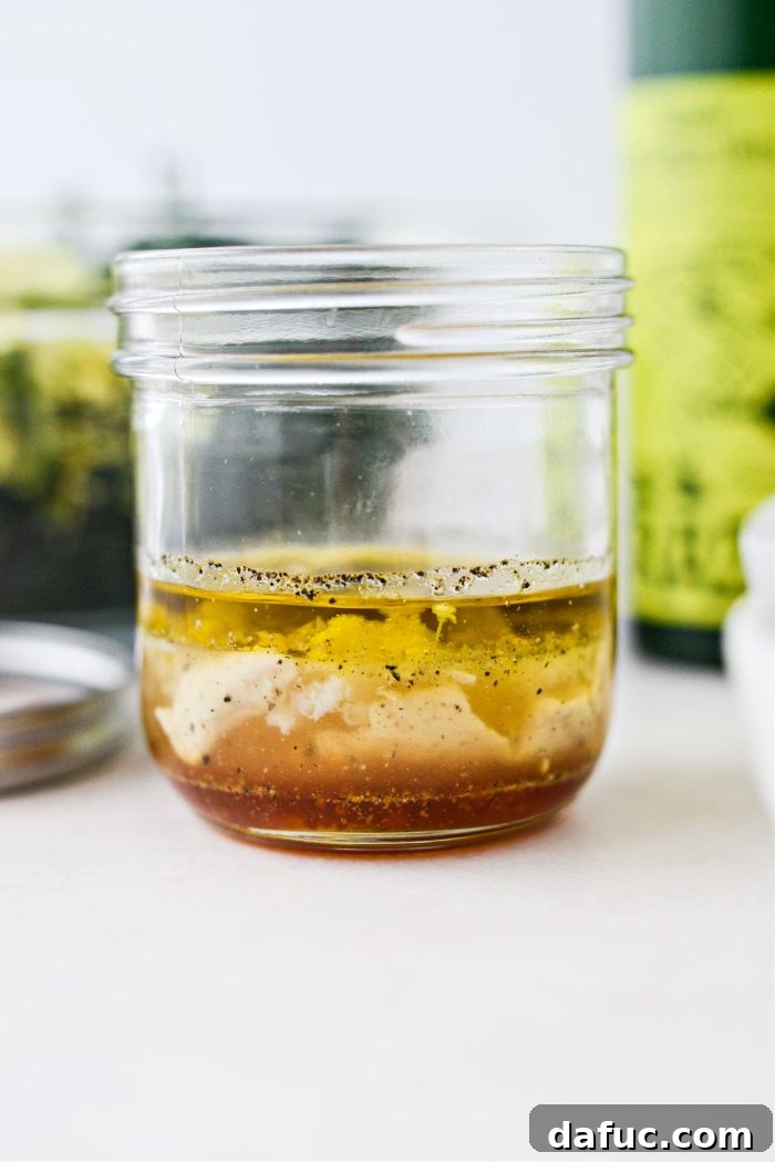 ingredients for hot honey dijon vinaigrette in jar
