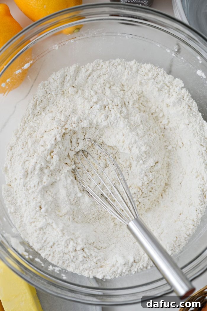Dry ingredients for shortbread crust being whisked together
