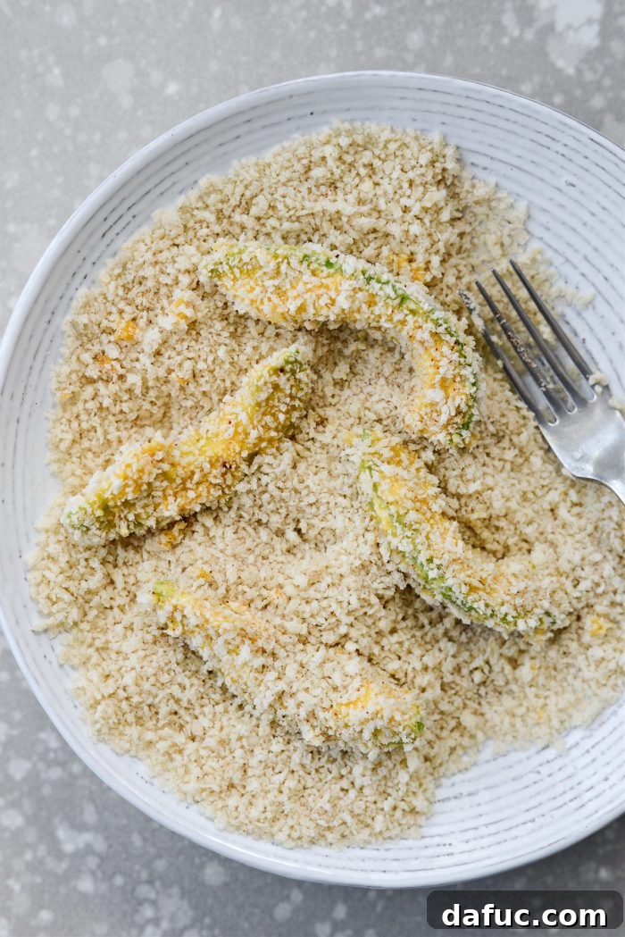 Avocado fries coated and ready for air frying