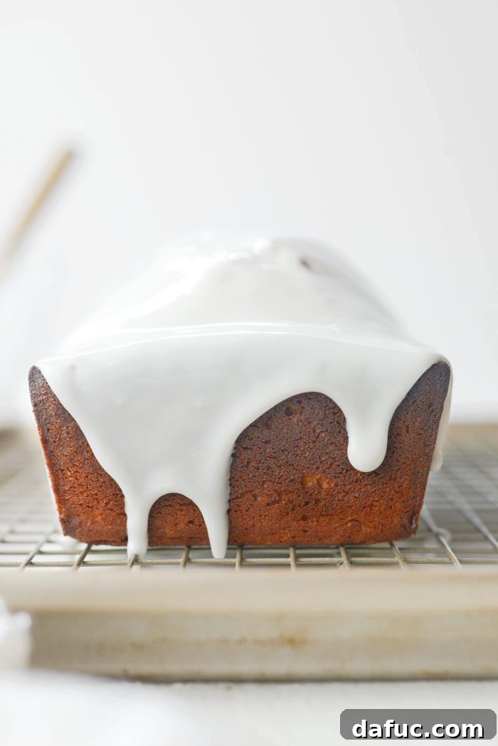 Creamy Grapefruit Zing Cake 16 The sour cream glaze being poured over the completely cooled Grapefruit Sour Cream Cake