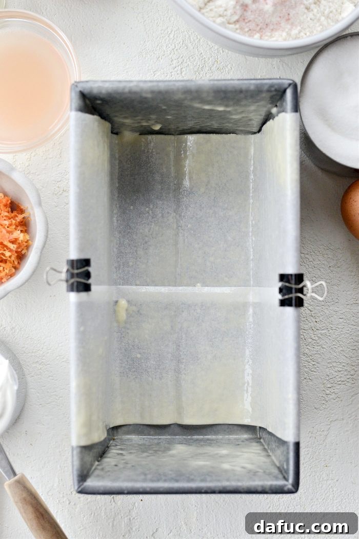 Creamy Grapefruit Zing Cake 5 Oven preheated and an 8x5 loaf pan lined with parchment paper and sprayed with nonstick spray