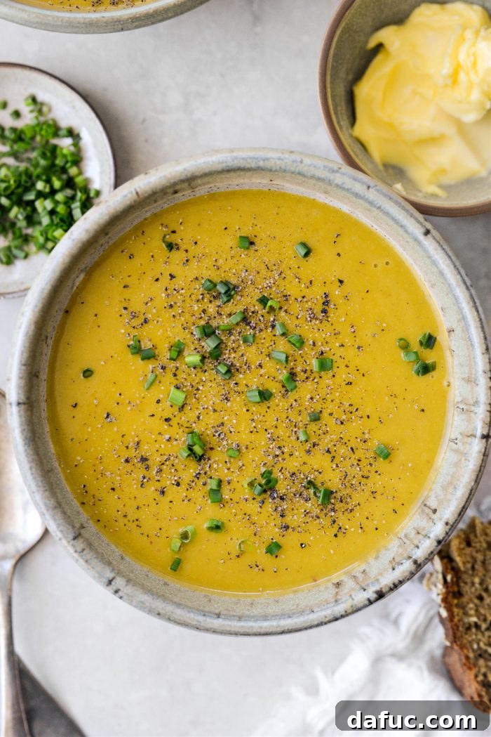 Hearty Irish Vegetable Soup 17 A bowl of Irish Vegetable Soup generously topped with black pepper and snipped chives.
