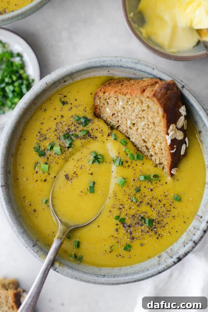 Hearty Irish Vegetable Soup 21 A close-up of Irish Vegetable Soup, highlighting its smooth texture and fresh garnishes.