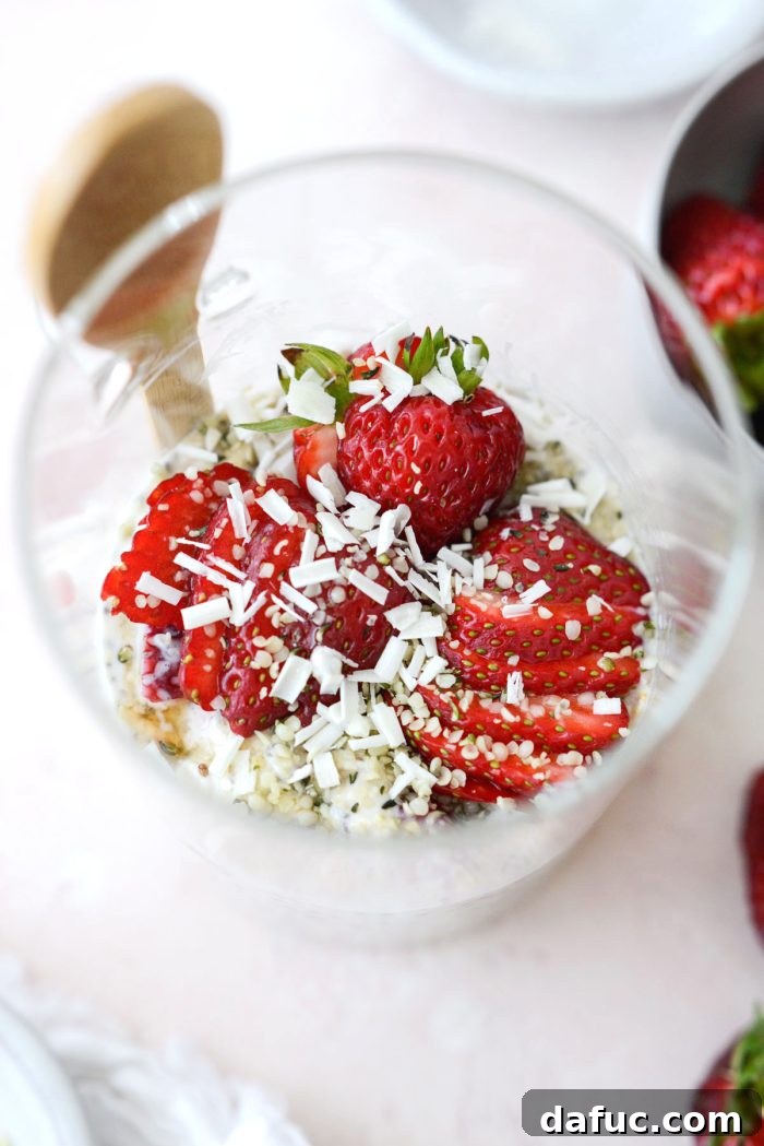 Creamy Strawberry Overnight Oats 12 Another beautiful shot of Strawberries and Cream Overnight Oats with toppings, ready to eat.