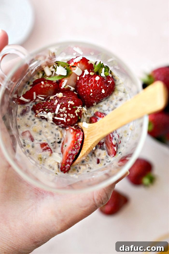 Creamy Strawberry Overnight Oats 15 A final, mouth-watering image of Strawberries and Cream Overnight Oats in a beautiful setting.
