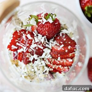 A delightful image of Strawberries and Cream Overnight Oats, ready to be enjoyed.