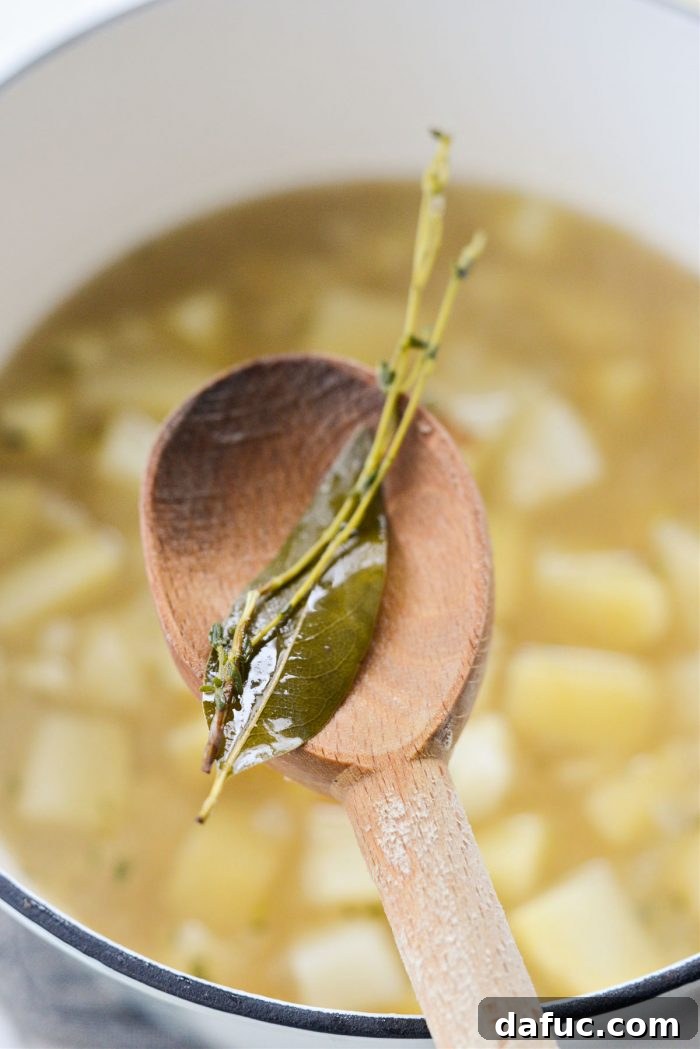 Hearty Cauliflower Potato Bisque 14 remove bay leaf and thyme sprigs