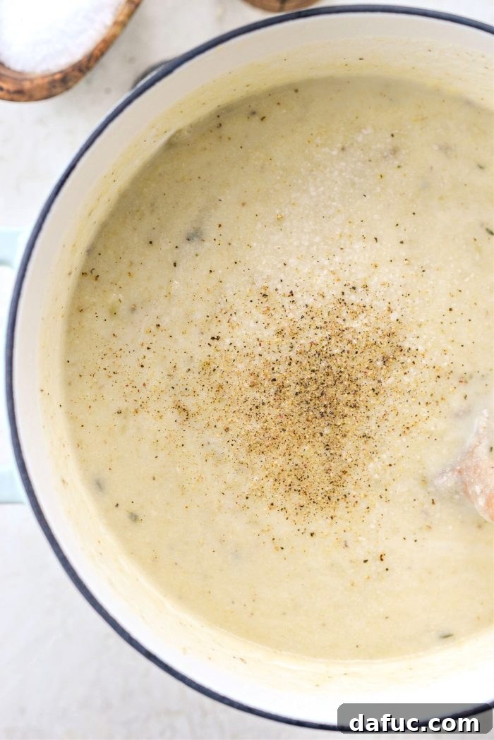 Hearty Cauliflower Potato Bisque 18 season with salt and pepper