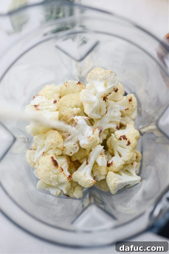 Hearty Cauliflower Potato Bisque 6 add cauliflower and milk to blender