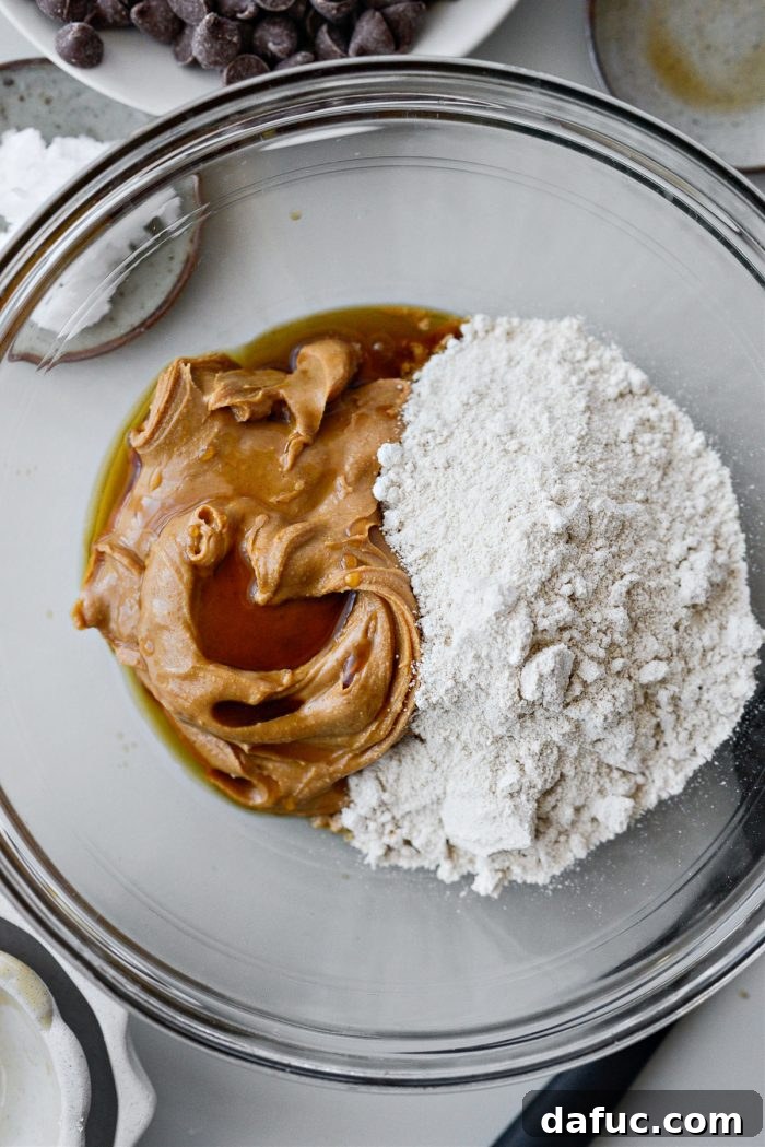 peanut butter, oat flour, maple syrup and vanilla in bowl