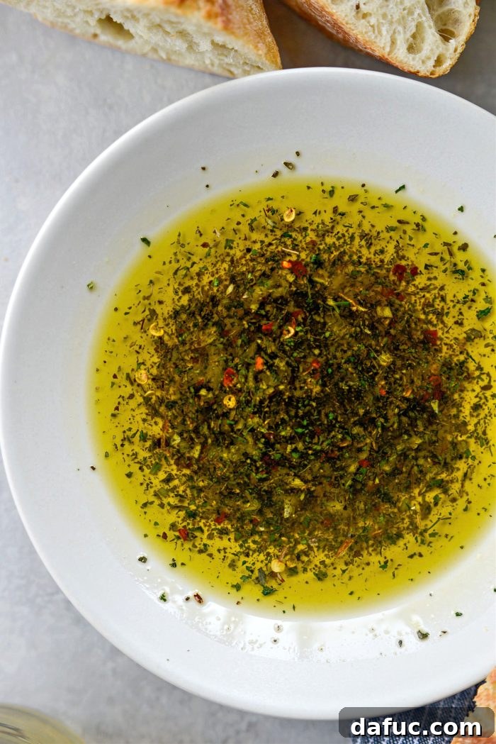 Garlic Herb Infused Dipping Oil 11 Finished Garlic Herb Olive Oil Bread Dip ready to be served
