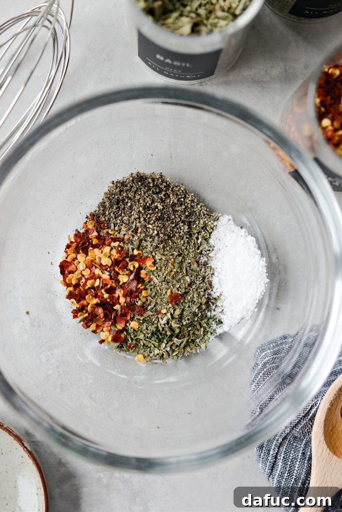 Garlic Herb Infused Dipping Oil 5 Bowl of combined dried herbs and spices for bread dip