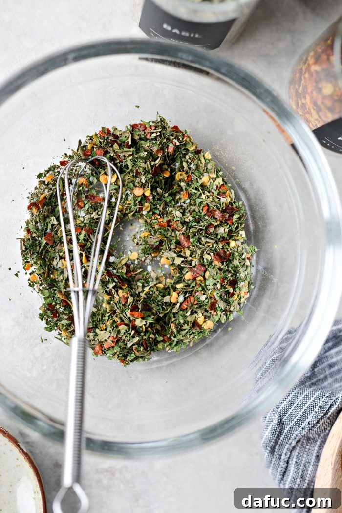 Garlic Herb Infused Dipping Oil 6 Whisked dry spices and herbs for bread dip