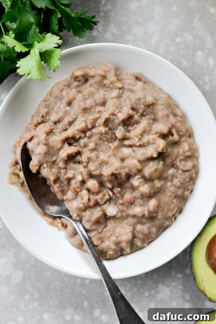 A bowl of delicious and creamy fat-free refried beans