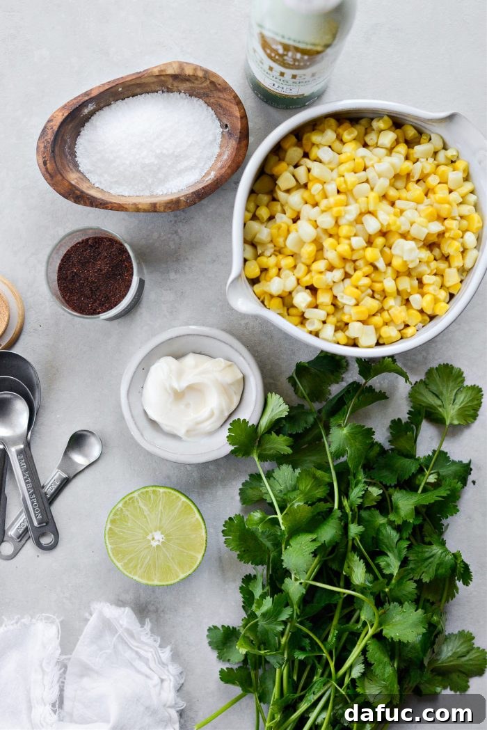 Zesty Mexican Street Corn Dip 4 Fresh ingredients for Mexican Street Corn Salsa, including corn, lime, cilantro, and spices