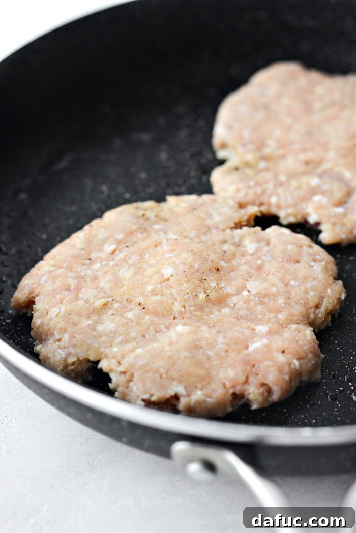 Patty with onion and jalapeño pressed in