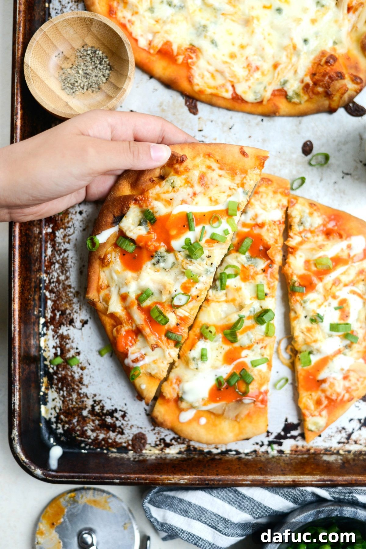Another view of the finished Buffalo Chicken Flatbread Pizzas, ready for slicing and serving.