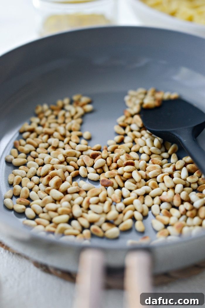 Bright Lemon Basil Parmesan Pasta Salad 10 Toasted pine nuts in a small skillet, golden brown and fragrant
