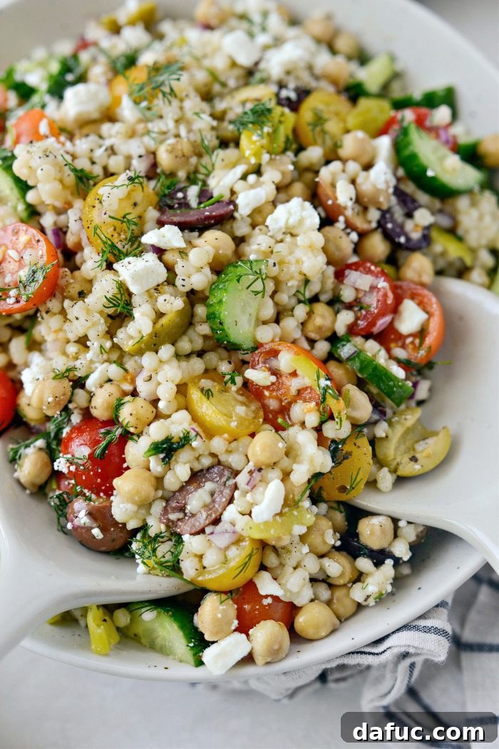 Vibrant Mediterranean Couscous Salad 15 A final close-up shot of the Greek Couscous Salad, emphasizing texture and freshness.