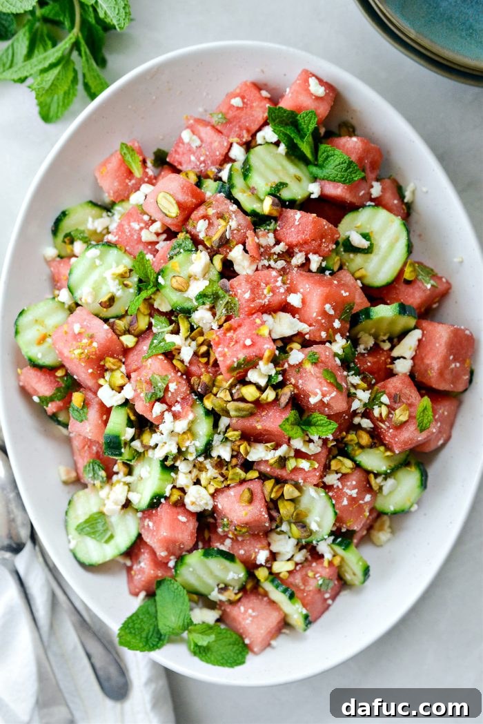 Refreshing Watermelon Feta Cucumber Salad 9 Gently tossing the cucumber watermelon feta salad