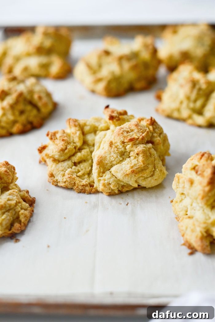 Effortlessly Fluffy Drop Biscuits 2 Easy Homemade Drop Biscuits - Golden brown, fluffy biscuits fresh from the oven.