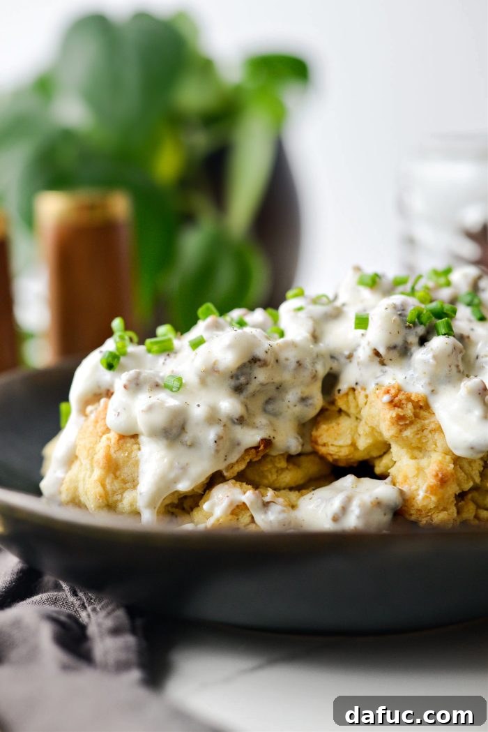 Effortlessly Fluffy Drop Biscuits 15 Easy Homemade Drop Biscuits with a generous serving of breakfast sausage gravy.