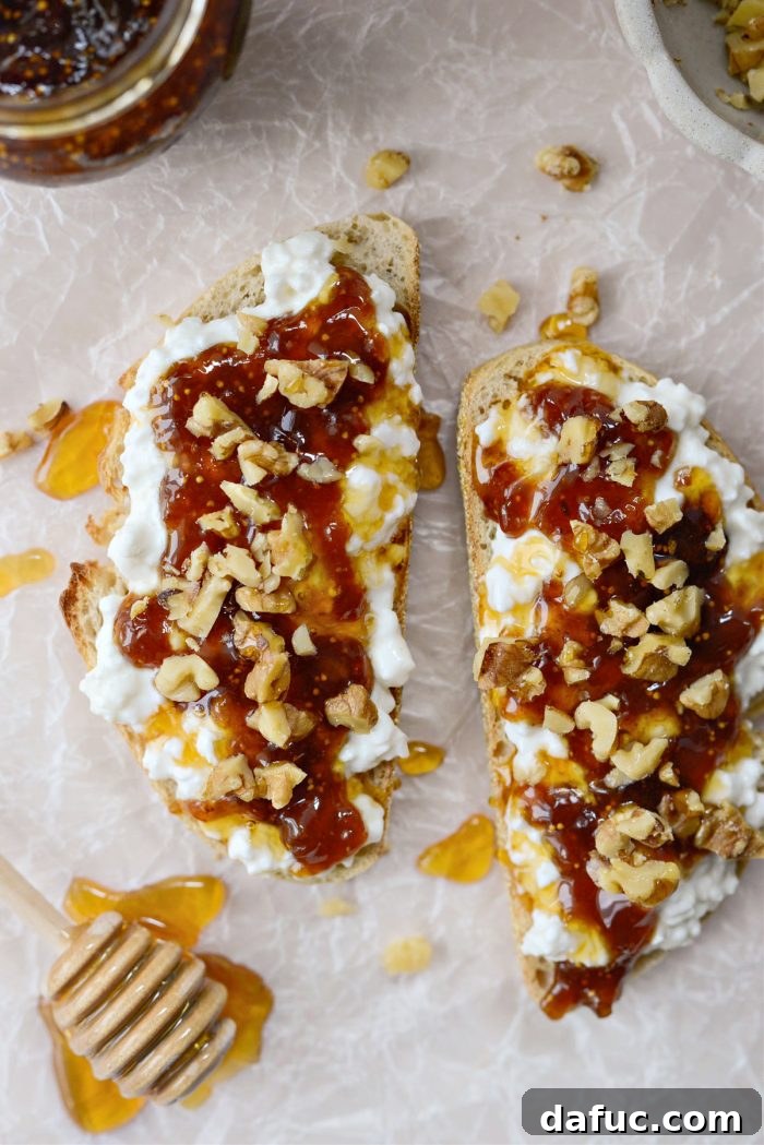 Honeyed Fig & Creamy Cottage Cheese Toast 3 Close-up of a prepared Honey Fig Jam and Cottage Cheese Toast with honey drizzled over.