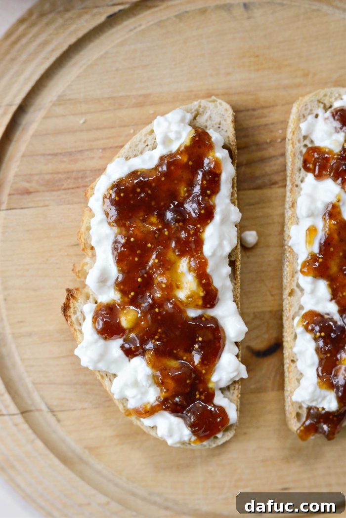 Honeyed Fig & Creamy Cottage Cheese Toast 6 Spreading delicious fig jam over the cottage cheese layer on toasted sourdough.