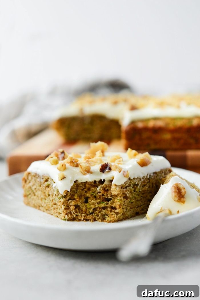 Lush Zucchini Cake with Cream Cheese Frosting 24 A final close-up image of the Zucchini Cake with Cream Cheese Frosting, emphasizing its texture