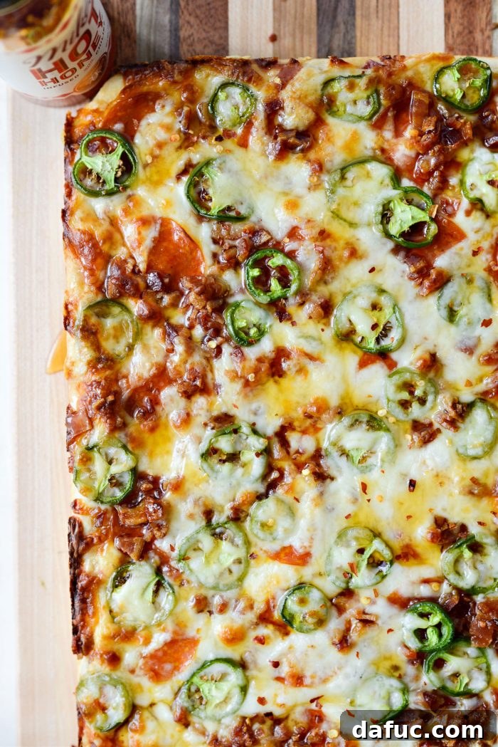Sweet Heat Bacon Jalapeño Pizza 15 Drizzling hot honey on Bacon Jalapeno Focaccia Pizza