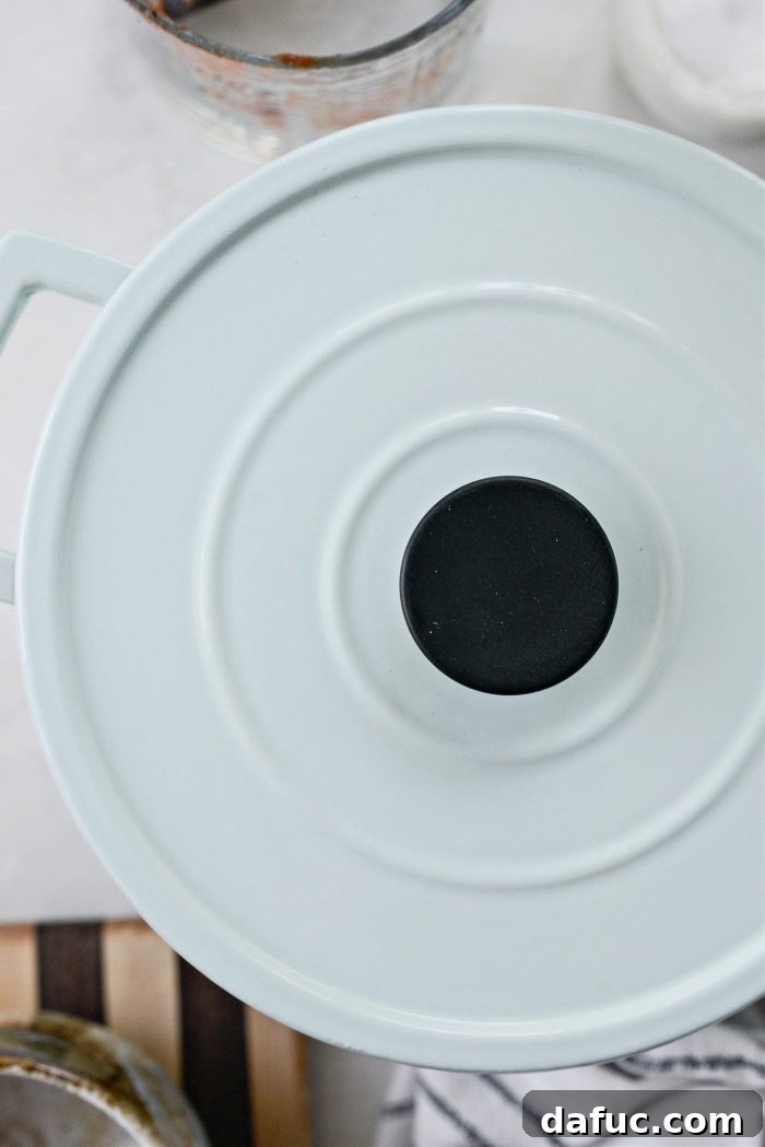 Ladle soup into bowls and top with desired toppings!