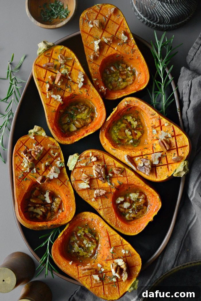 Serving platter with beautiful Roasted Maple Rosemary Honeynut Squash.