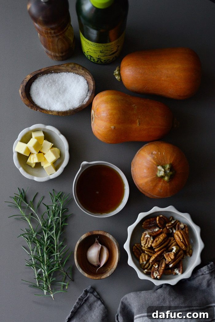 Ingredients laid out for Roasted Maple Rosemary Honeynut Squash recipe.