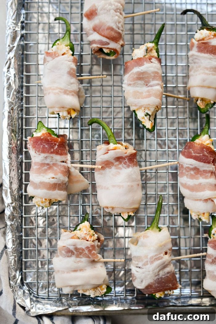 Fiery Bacon Bombs 9 wrap jalapenos with half a piece of bacon