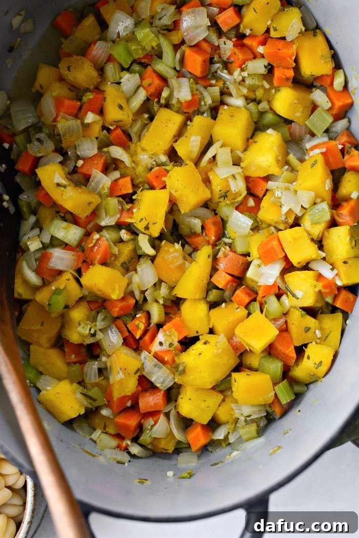 Golden Autumn Pumpkin Minestrone 11 Sautéed vegetables and herbs after softening