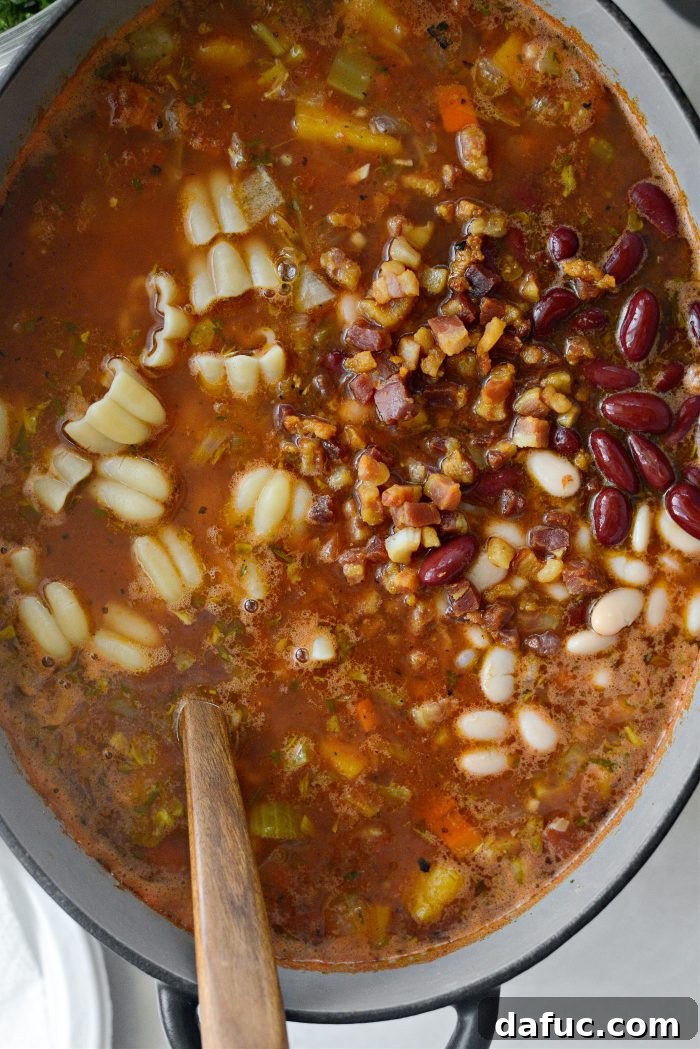 Golden Autumn Pumpkin Minestrone 14 Cooked pasta, crispy pancetta, and beans added to the soup