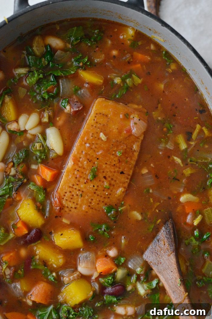 Golden Autumn Pumpkin Minestrone 18 Parmesan rind and bay leaf removed from the soup