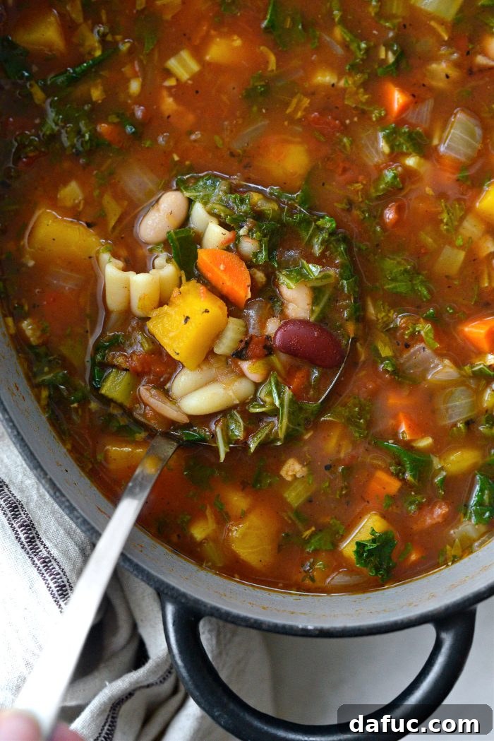 Golden Autumn Pumpkin Minestrone 19 Pumpkin Minestrone in a large pot, ready to be served