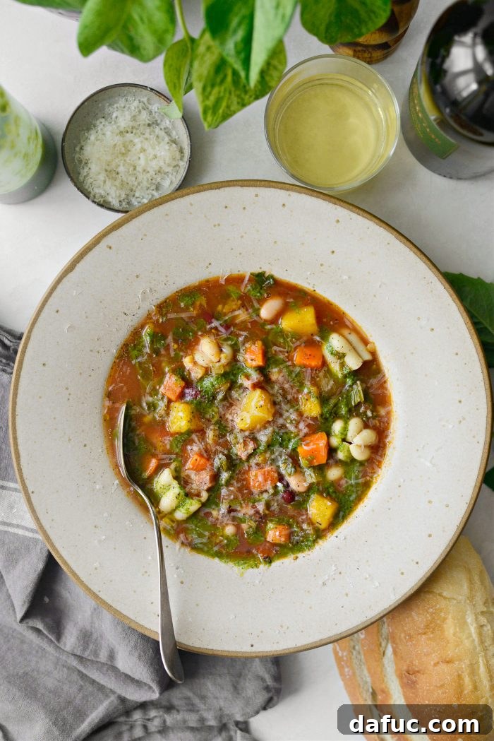 Golden Autumn Pumpkin Minestrone 22 Pumpkin Minestrone in a bowl, ready for eating