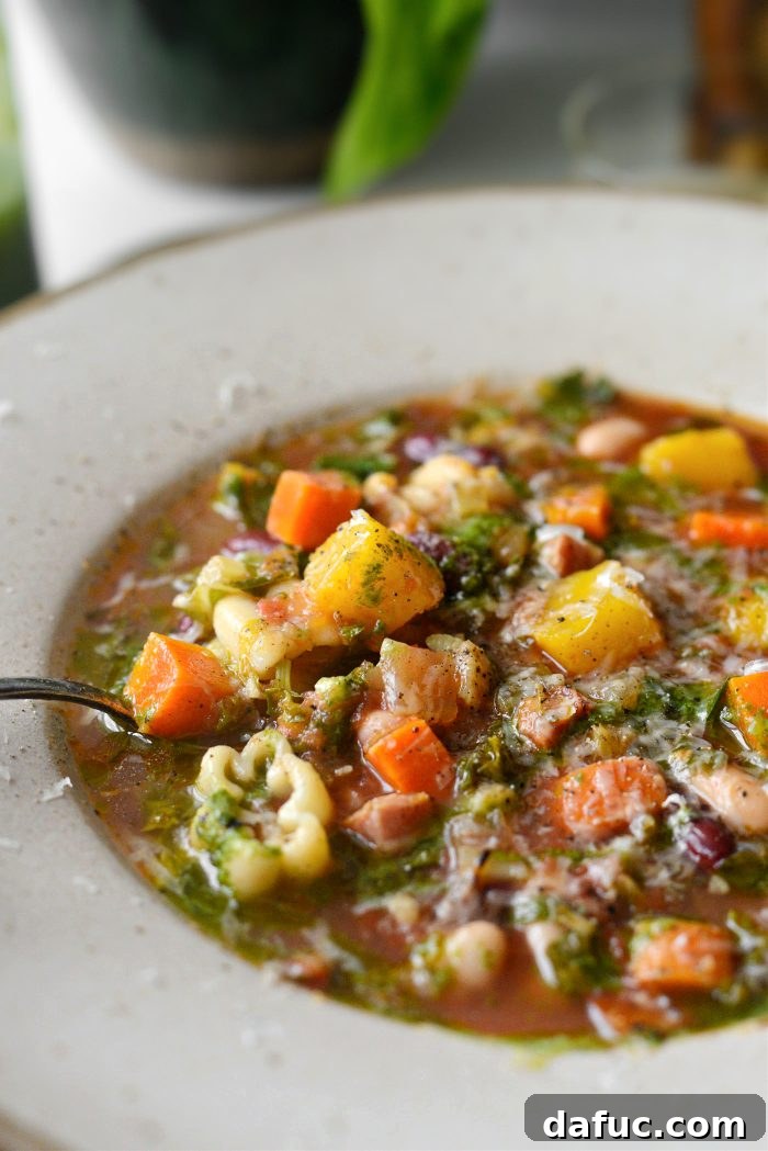 Golden Autumn Pumpkin Minestrone 24 Pumpkin Minestrone with basil leaves and parmesan