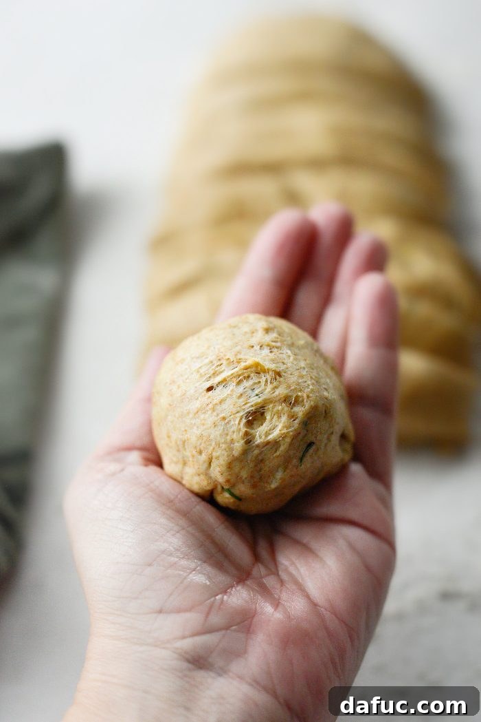 Fragrant Rosemary and Sweet Caramelized Onion Whole Wheat Rolls 22 shape into tight uniform balls