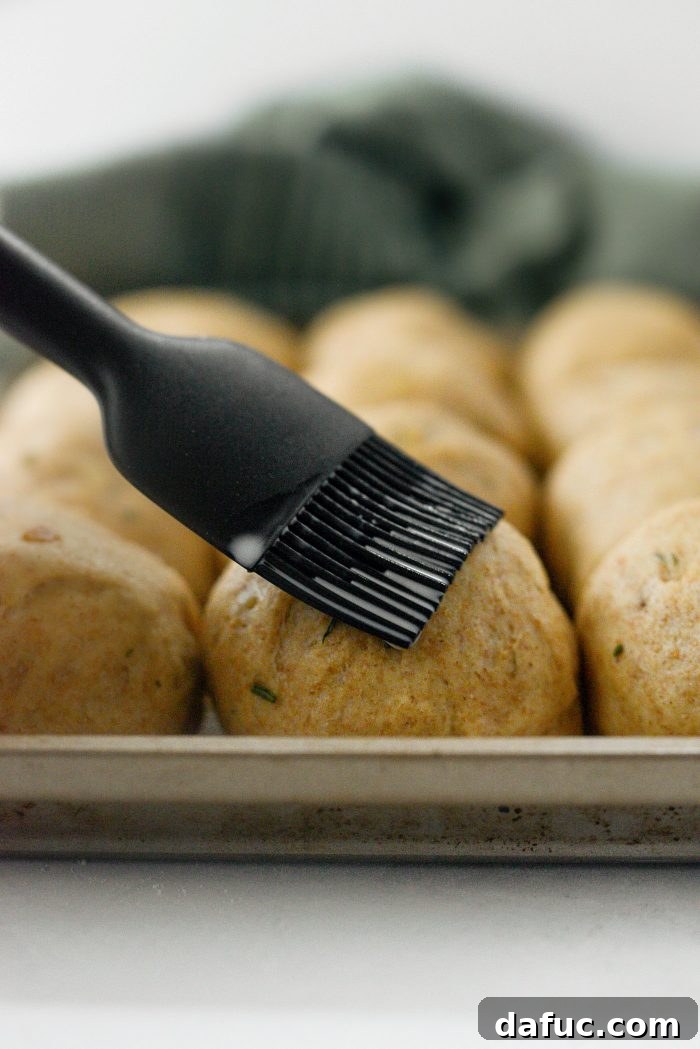 Fragrant Rosemary and Sweet Caramelized Onion Whole Wheat Rolls 26 brush with milk and bake