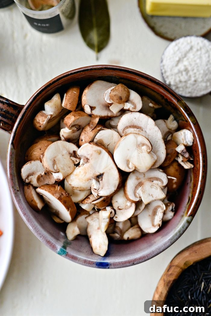 bowl of sliced cremini mushrooms