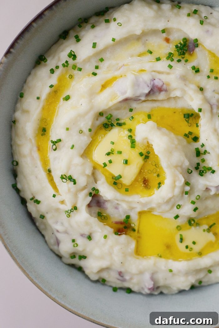 Velvet Garlic Potatoes 2 Roasted Garlic Mashed Potatoes with chives and melted butter